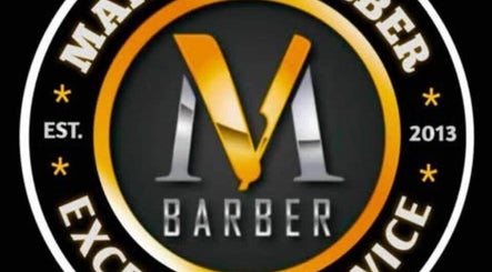 Logo of Marlon Barber Sambag 1 Branch, Cebu City, Central Visayas, PH, featuring a stylized 'M'.