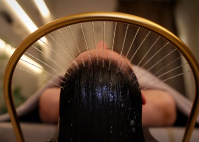 Relaxing head massage with water streams at Gili Head Spa, New York, New York, US.