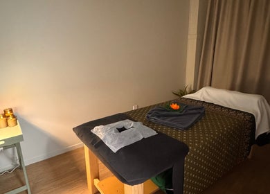 Serene massage room at Inlux Thai Massage & Spa in Pukekohe, Auckland, NZ, featuring a prepared massage table.