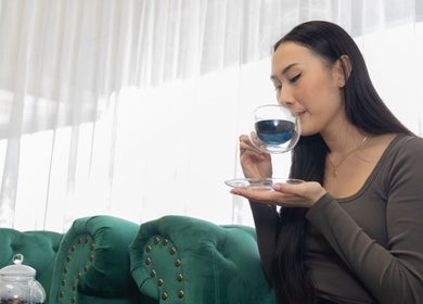Relaxing tea moment at Inlux Thai Massage & Spa, Pukekohe, Auckland, NZ, showcasing tranquility and elegance.