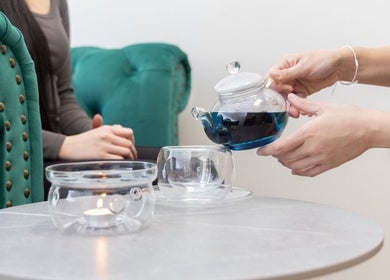 A calming tea session at Inlux Thai Massage & Spa, Pukekohe, Auckland, NZ, highlighting relaxation and comfort.