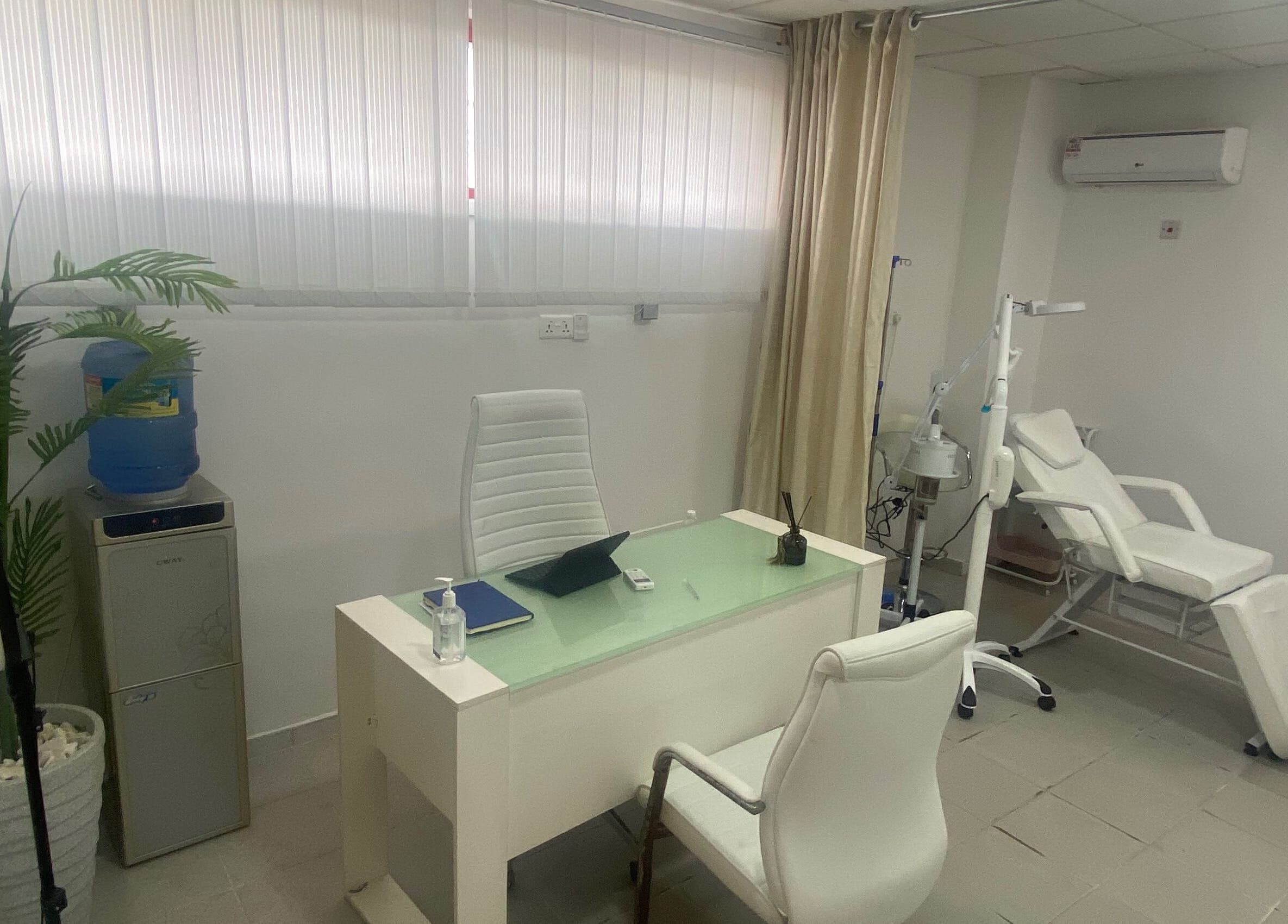 Modern consultation room at BOTOX-LAGOS, Lekki, Lagos, NG, featuring sleek furnishings and wellness equipment.