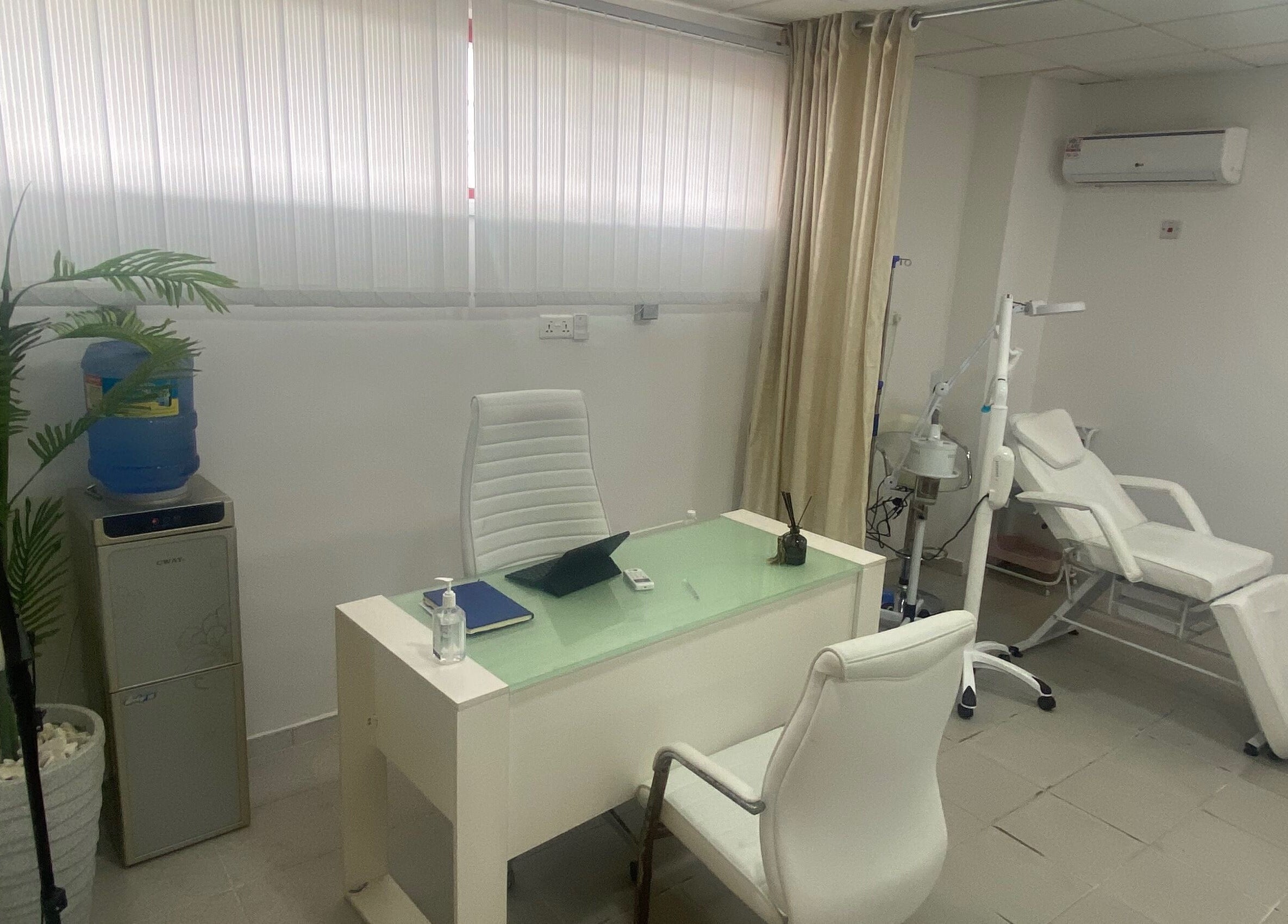 Modern consultation room at BOTOX-LAGOS, Lekki, Lagos, NG, featuring sleek furnishings and wellness equipment.