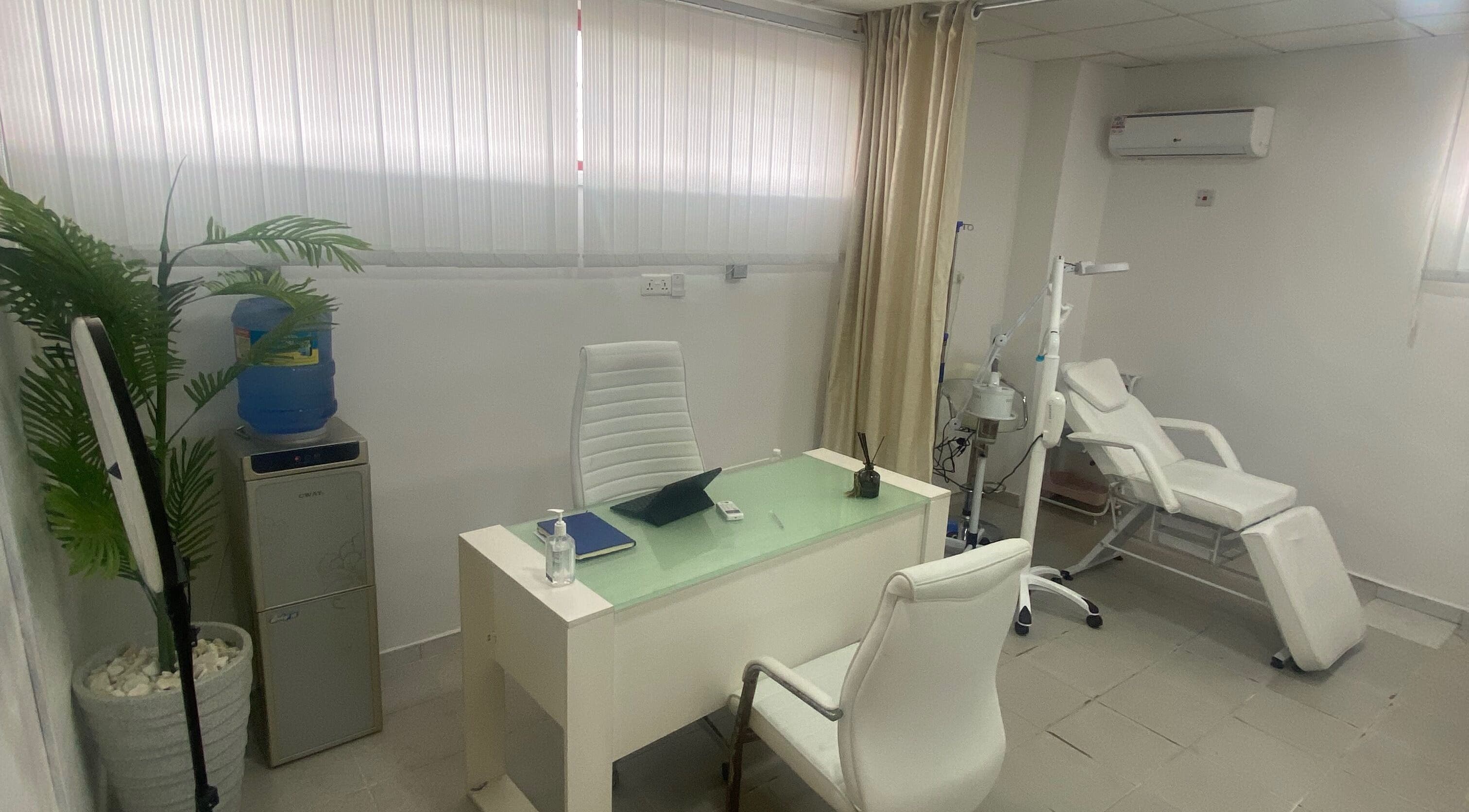 Modern consultation room at BOTOX-LAGOS, Lekki, Lagos, NG, featuring sleek furnishings and wellness equipment.