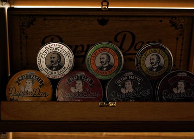 Vintage grooming products at Kingsmen Barbershop in Dubai, Dubai, AE, showcasing premium styling essentials.
