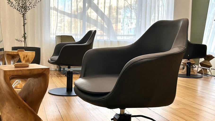 Stylish salon chairs and decor at Joey Myers Hair, South Yarra, Victoria, AU.