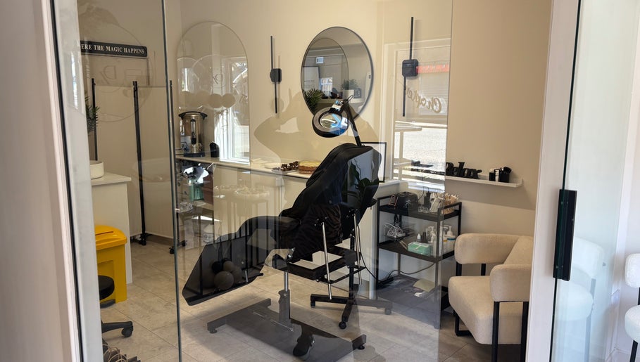 Cozy treatment room at Dzen Clinic, Crossgates, Scotland, GB with sleek decor and modern therapeutic chair.