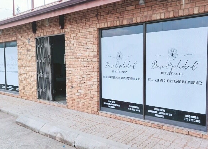 Exterior view of Bare& Polished salon at Westonaria, Gauteng, ZA, showcasing its stylish entrance.