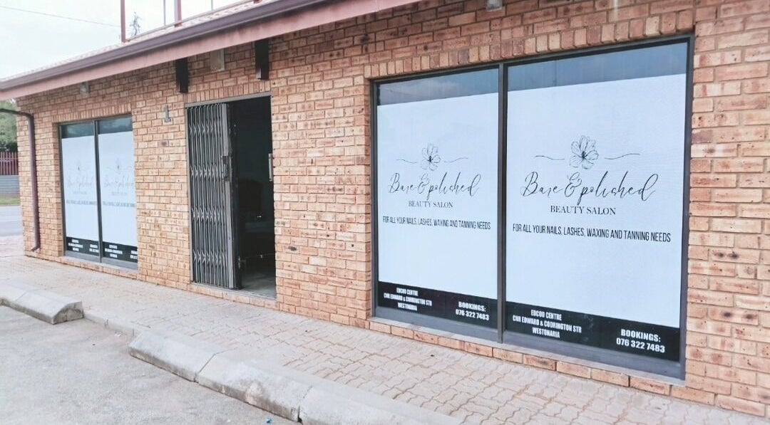Exterior view of Bare& Polished salon at Westonaria, Gauteng, ZA, showcasing its stylish entrance.