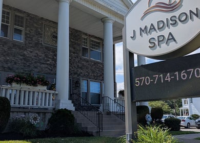 J. Madison Spa entrance with welcoming sign in Kingston, PA, US.