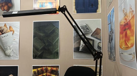 Creative wall decor with a modern lamp at Studiogelx, Cape Town, Western Cape, ZA.