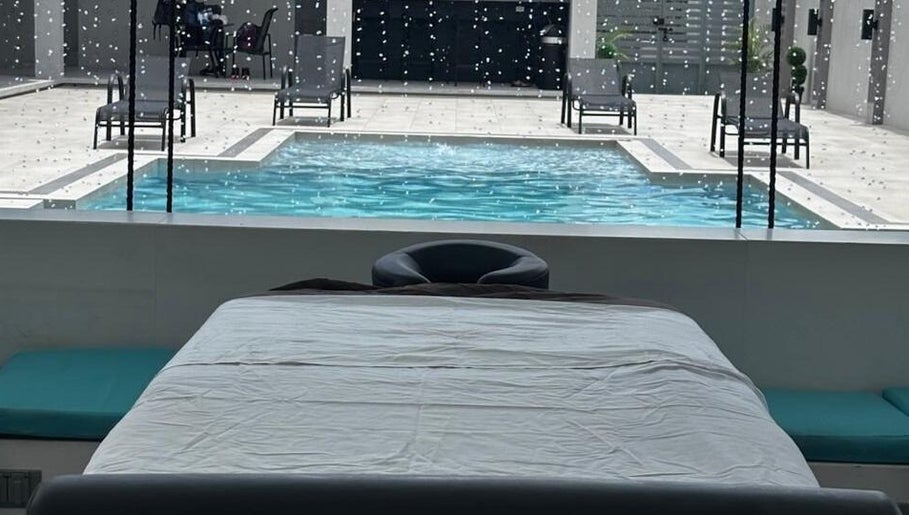 Relaxing poolside view at Solace by Josh in Chaguanas, Chaguanas, TT, perfect for a soothing experience.
