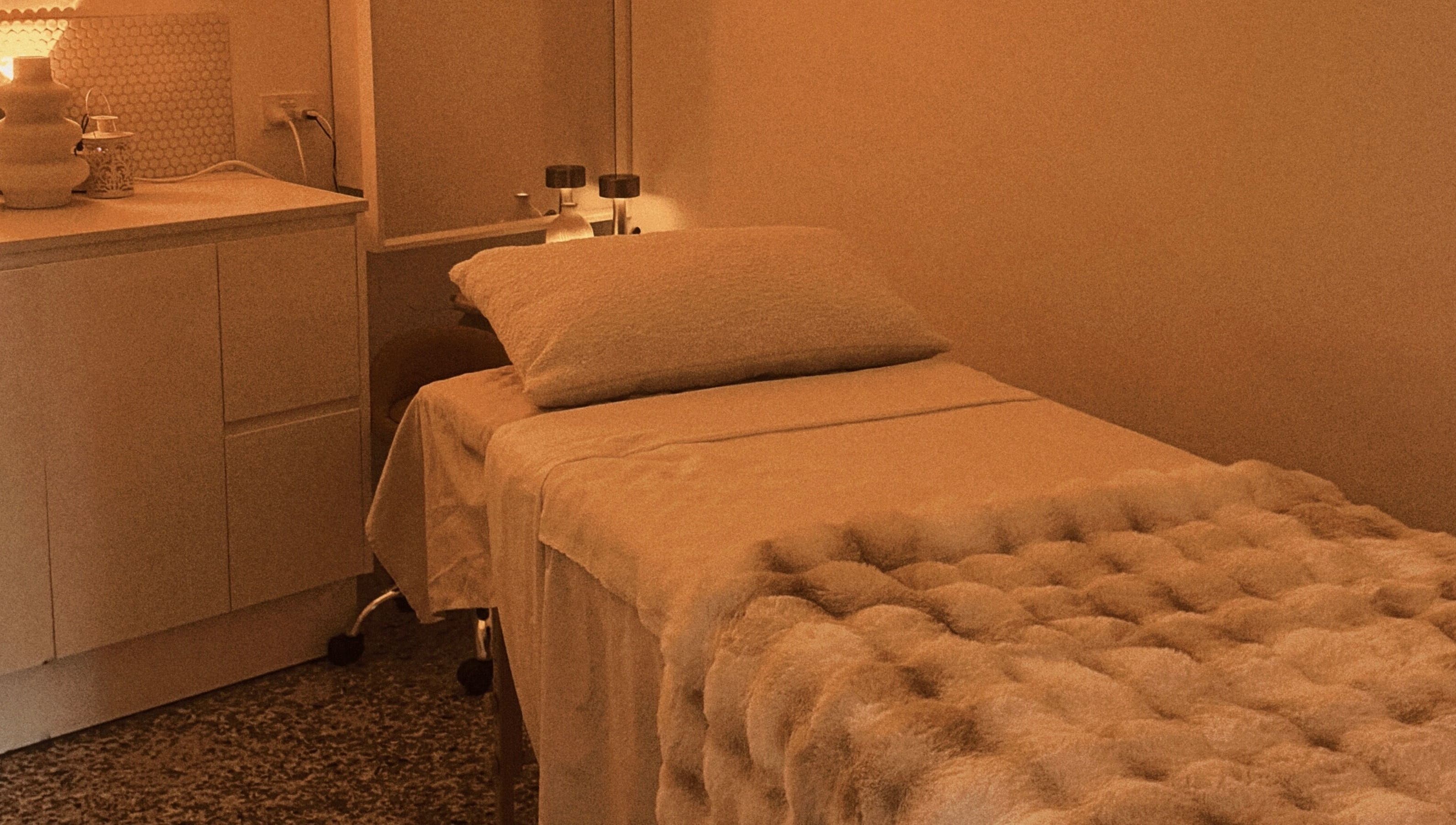 Serene massage room with cozy bed at The Serenity Room - Massage Studio, Surfers Paradise, Queensland, AU.