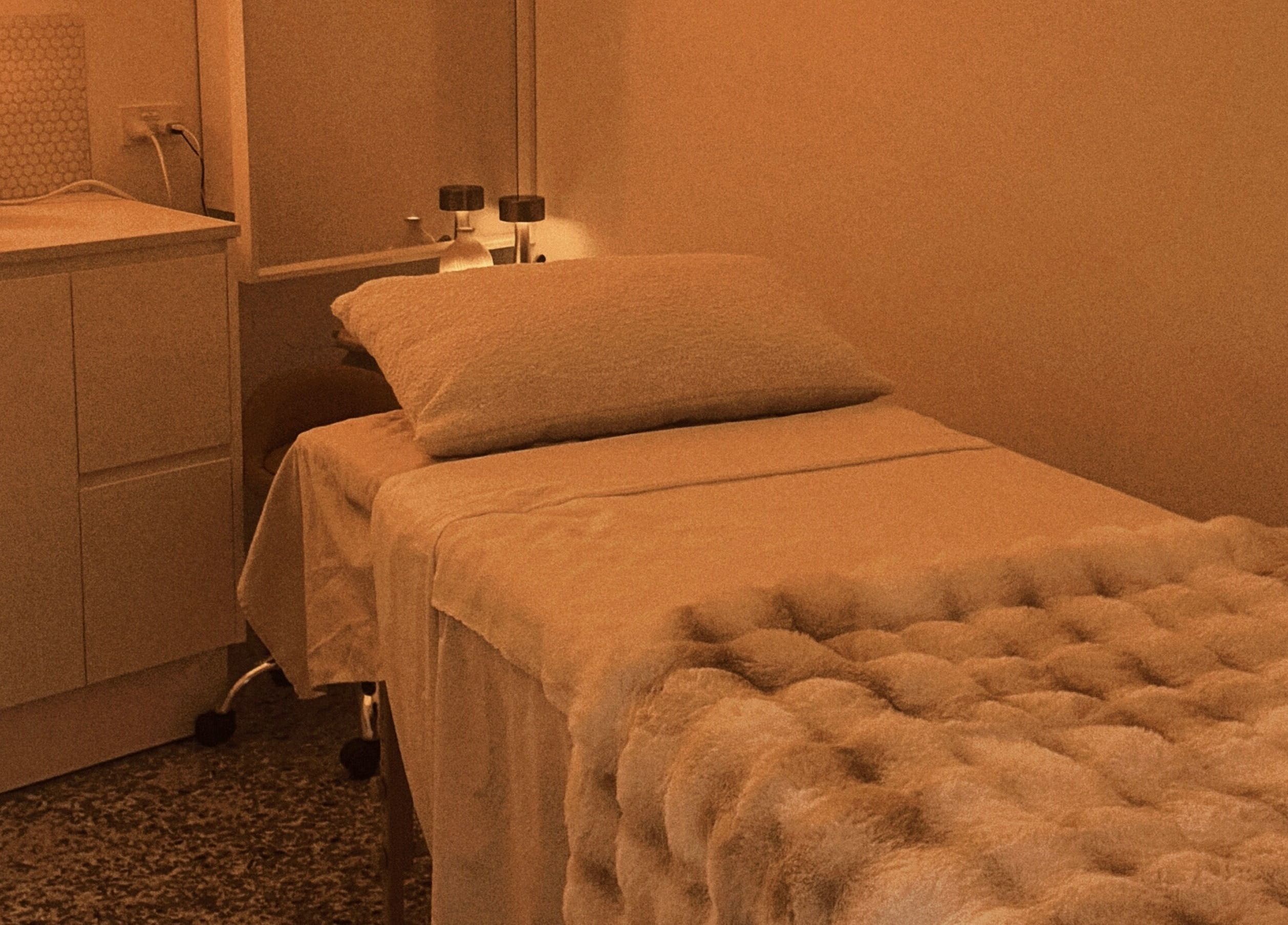 Serene massage room with cozy bed at The Serenity Room - Massage Studio, Surfers Paradise, Queensland, AU.