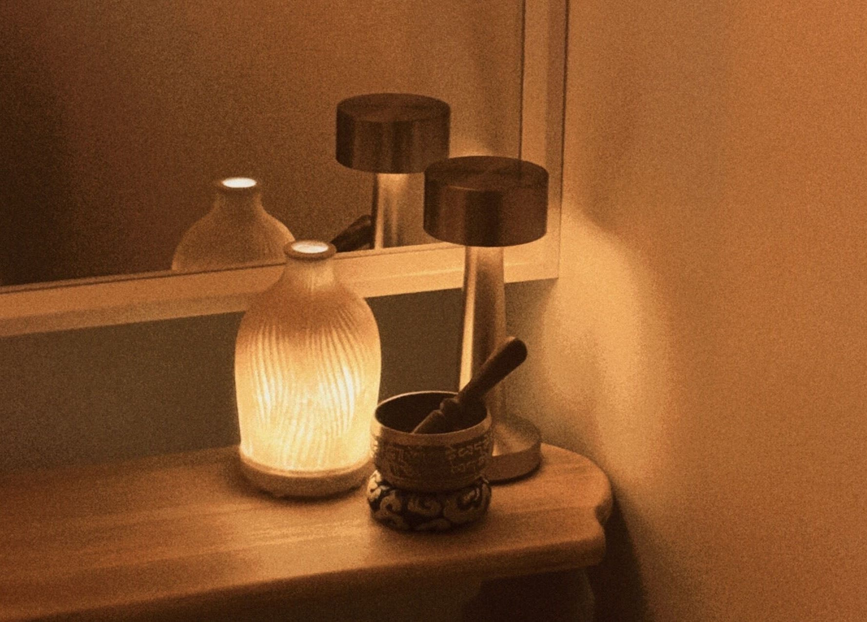 Ambient lighting with candle and decorations at The Serenity Room - Massage Studio, Surfers Paradise, Queensland, AU.