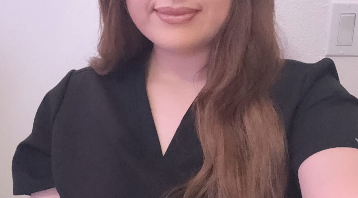 A professional at Lumina Skin Aesthetix in Phoenix, Arizona, US, providing exceptional beauty services.