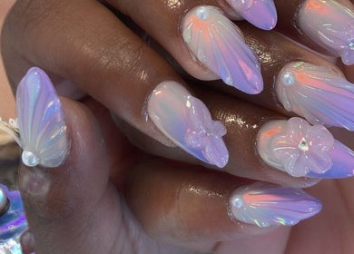 Stunning iridescent nails with floral accents at Aesthetic Nails and Beauty, Melbourne, Victoria, AU.