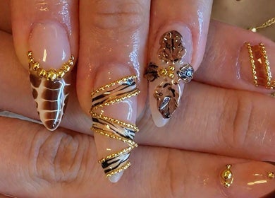 Intricate gold and black nail art at Aesthetic Nails and Beauty in Melbourne, Victoria, AU.