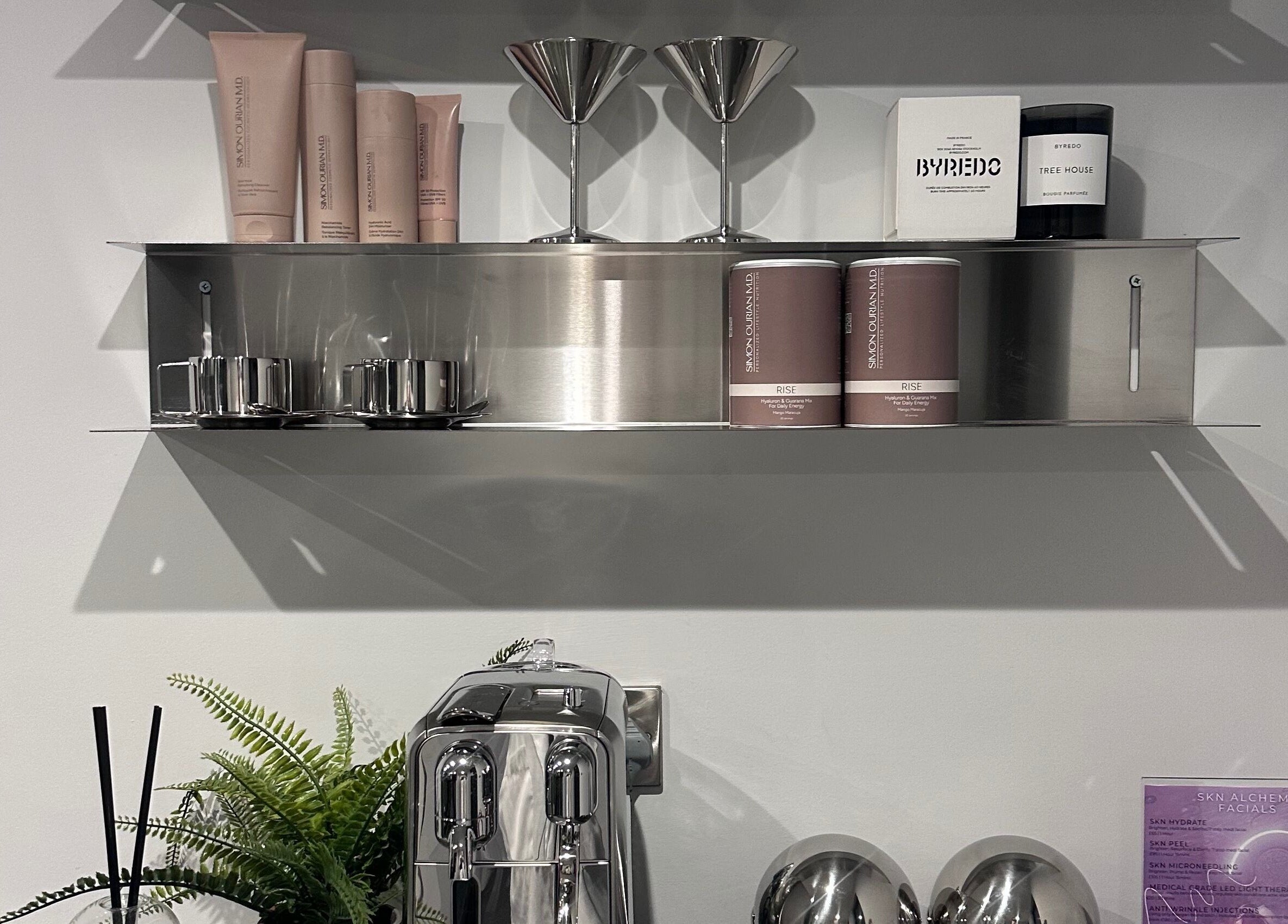 Sleek shelf displaying beauty products at SKN Lab Yorkshire, Wakefield, England, GB. Modern, elegant design.