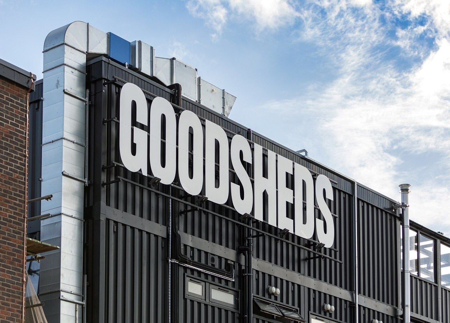 Exterior view of MANI.FEST Nails at Goodsheds, Barry, Wales, GB, highlighting modern industrial design.