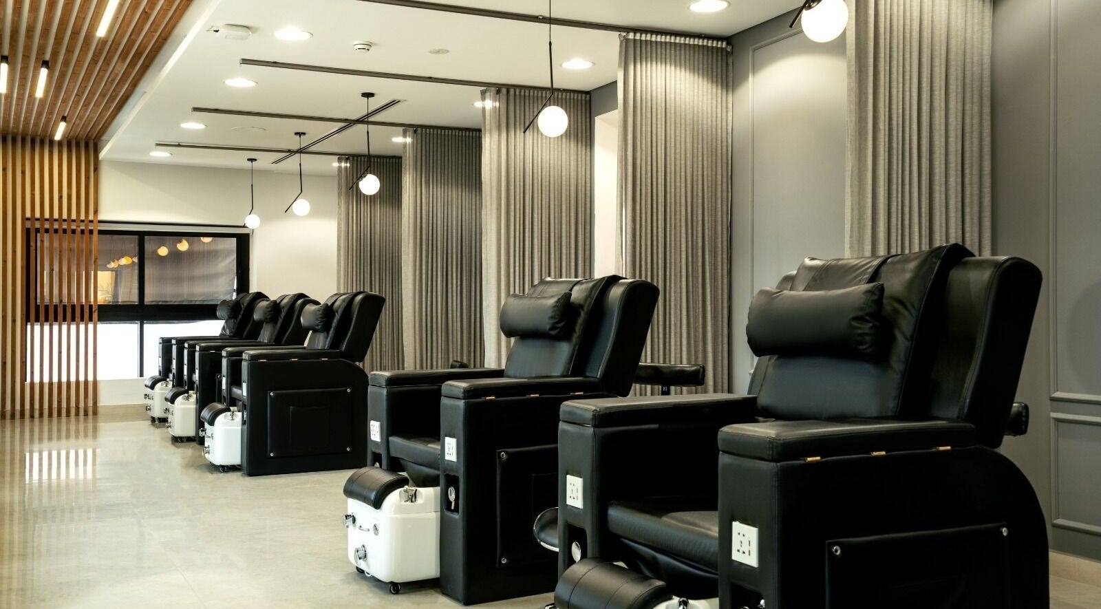 Elegant pedicure lounge at 306 Spa, Dubai, Dubai, AE, with plush seating and serene decor.