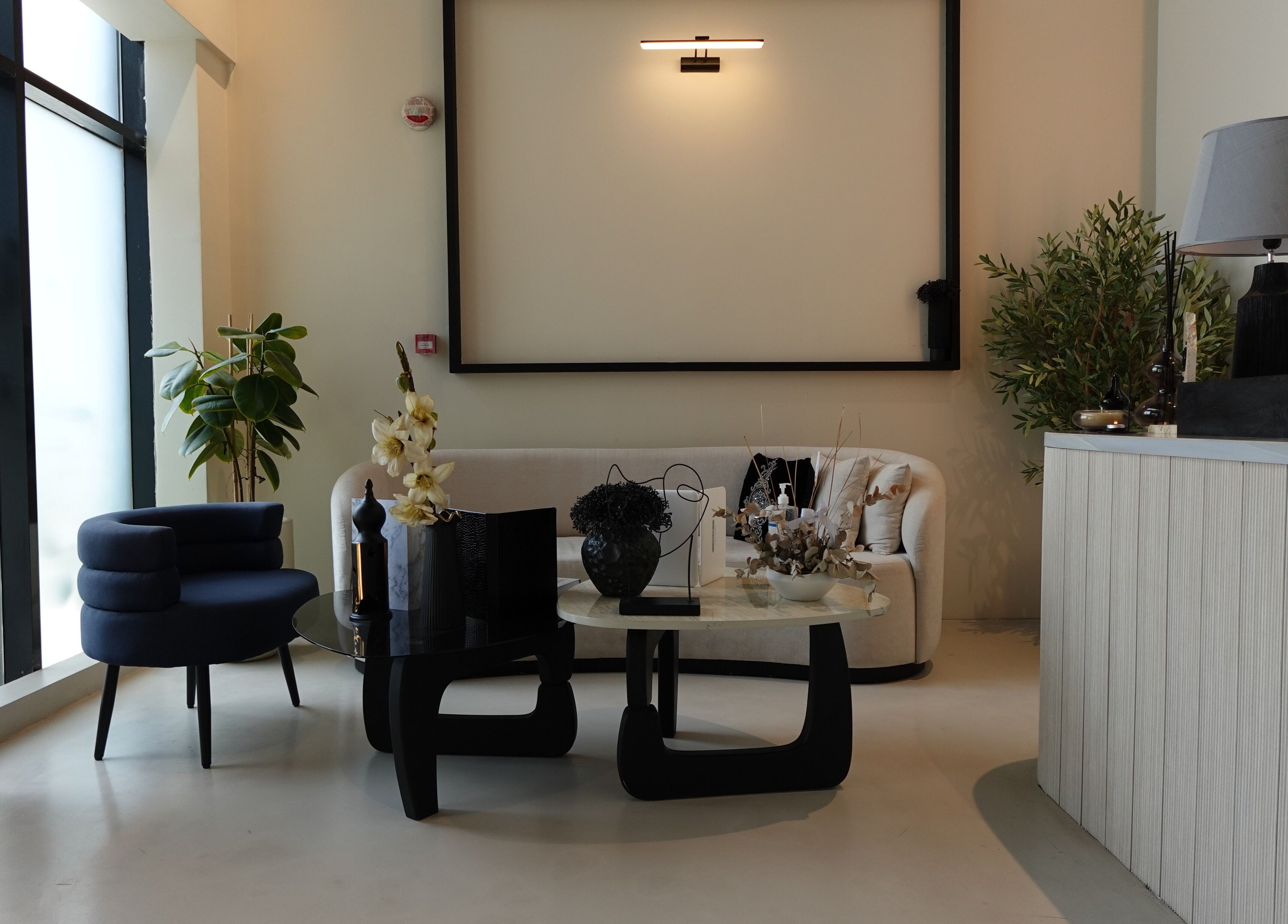 Sophisticated waiting area at Noura Fahed Salon, Dammam, Eastern Province, SA with modern decor.