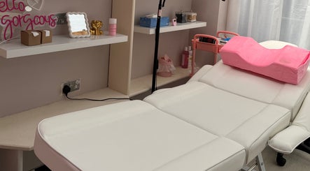 Relaxing treatment room at Noor Beauty Lab, Enfield, England, GB offers calming wellness ambiance.