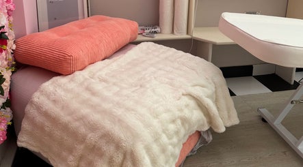 Luxurious treatment bed at Noor Beauty Lab, Enfield, England, GB, offering a relaxing wellness experience.