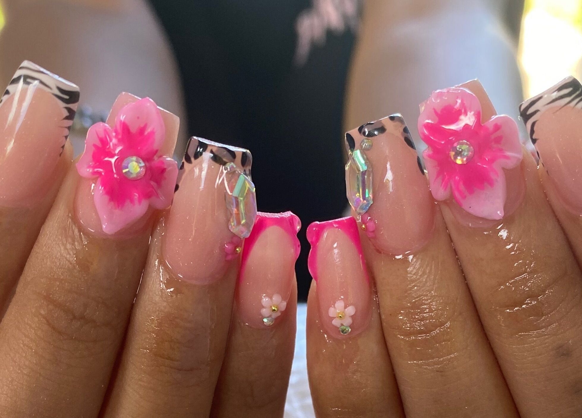 Elegant floral nail art at NailzbyTan in Biabou, Charlotte, VC featuring intricate details and vibrant colors.