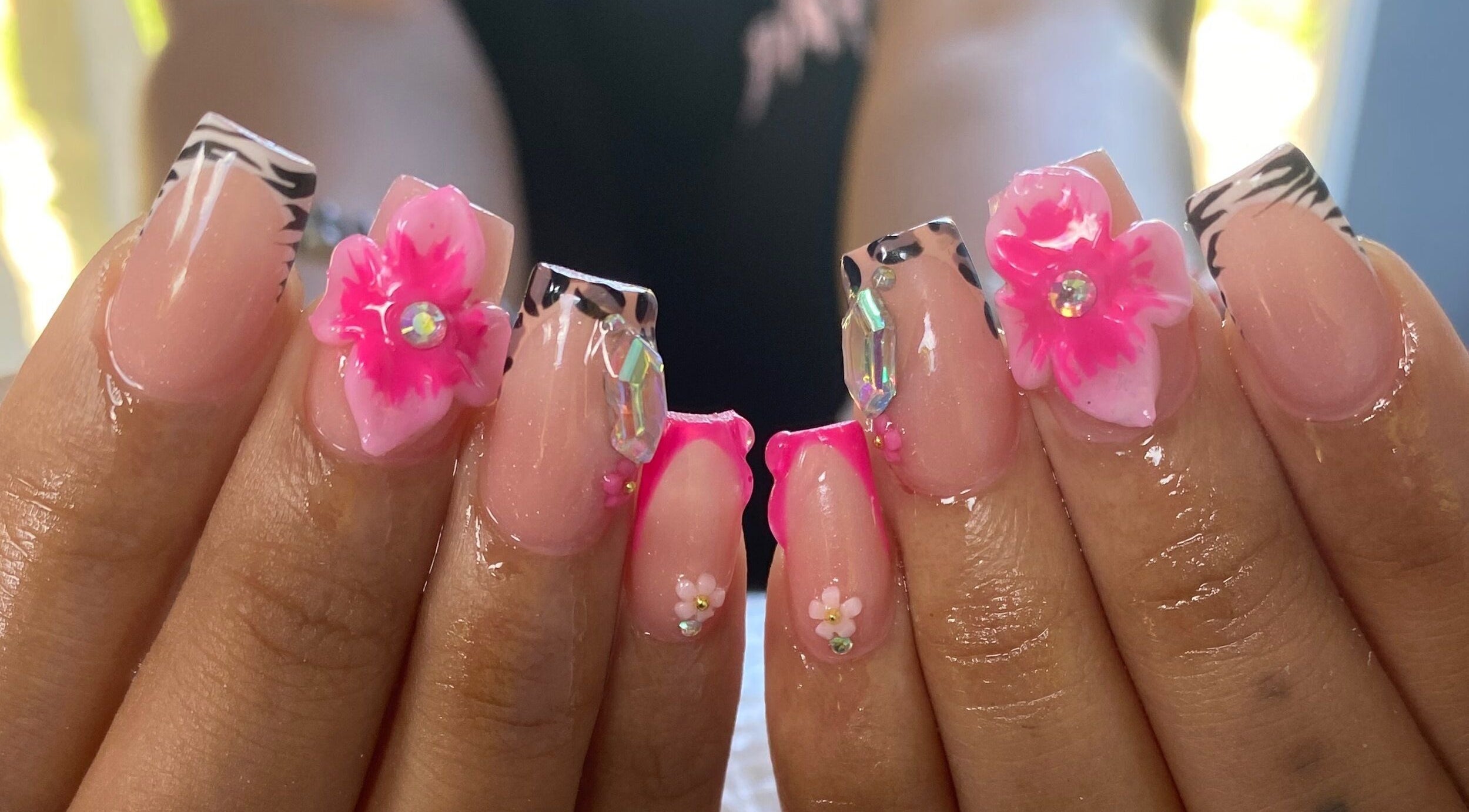 Elegant floral nail art at NailzbyTan in Biabou, Charlotte, VC featuring intricate details and vibrant colors.
