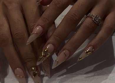 Intricate nail art with gold accents at Nelgai Beauty, Cape Town, Western Cape, ZA.