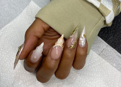 Intricate seashell nail art at Nelgai Beauty, Cape Town, Western Cape, ZA showcasing elegance and artistry.