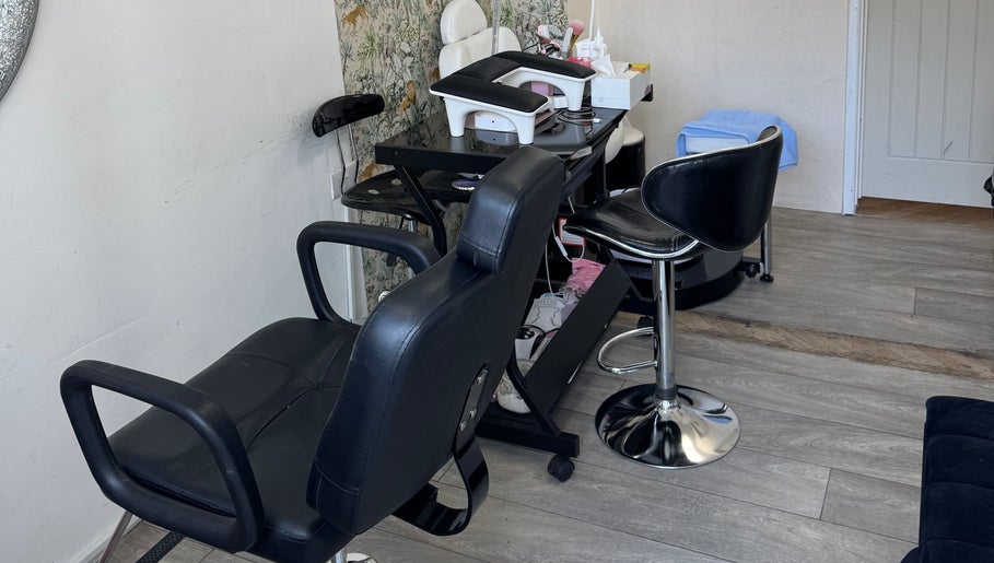 Stylish salon chairs at Iconic Beauties, Hayes, England, GB offering premium beauty experiences.