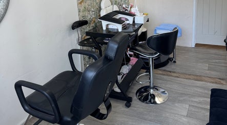 Stylish salon chairs at Iconic Beauties, Hayes, England, GB offering premium beauty experiences.