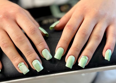 Mint green manicured nails at Iconic Beauties, Hayes, England, GB.