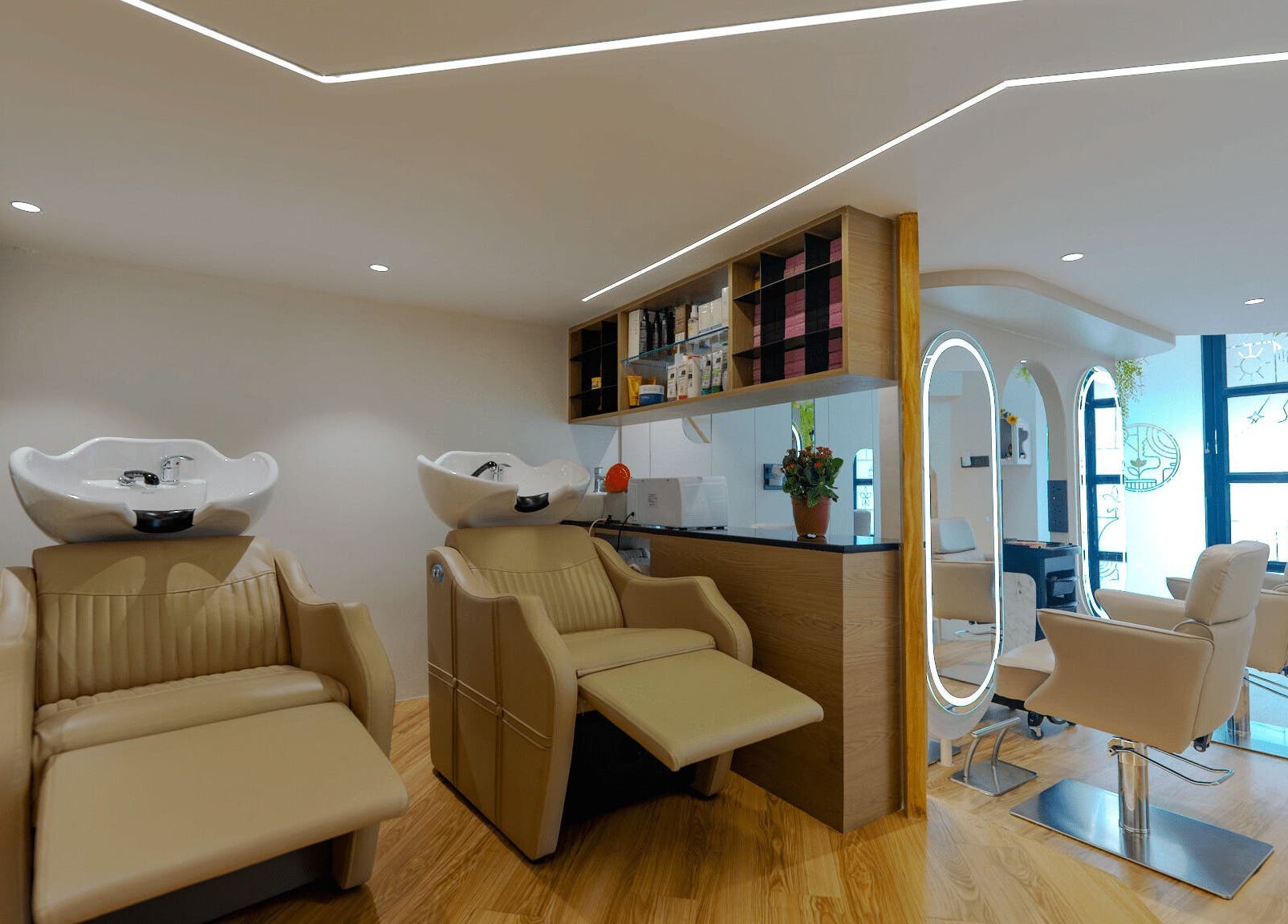 Modern salon interior at Mist Salon, Spa & Nail Salon, Pune, Maharashtra, IN with chic decor and styling stations.