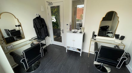 Modern styling stations at Exodus Hair in Derby, England, GB offering a sleek and inviting ambiance.
