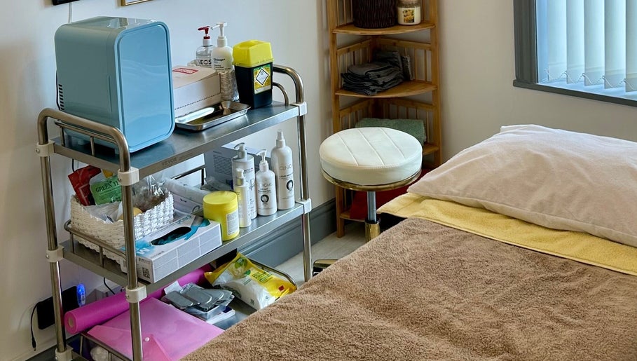 Flourishskinroom treatment room with organized supplies in Coventry, England, GB.
