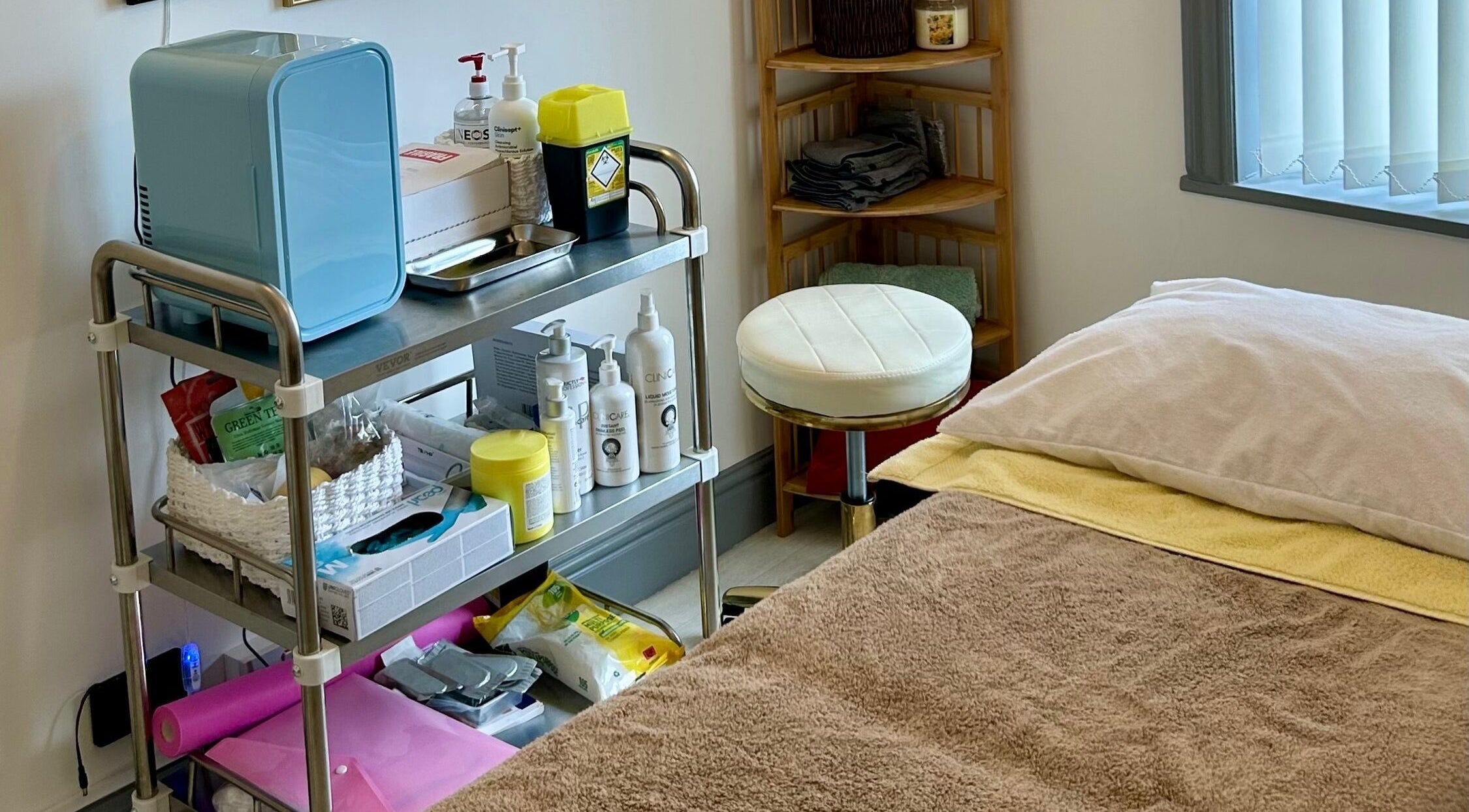 Flourishskinroom treatment room with organized supplies in Coventry, England, GB.