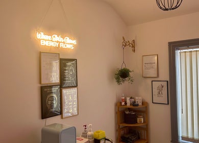 Tranquil therapy room at Flourishskinroom in Coventry, England, GB with decor and wellness products.