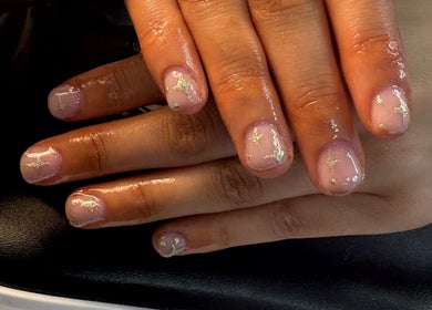 Elegant gold-accented nails at beautybar_.byterri in Hebburn, England, GB.