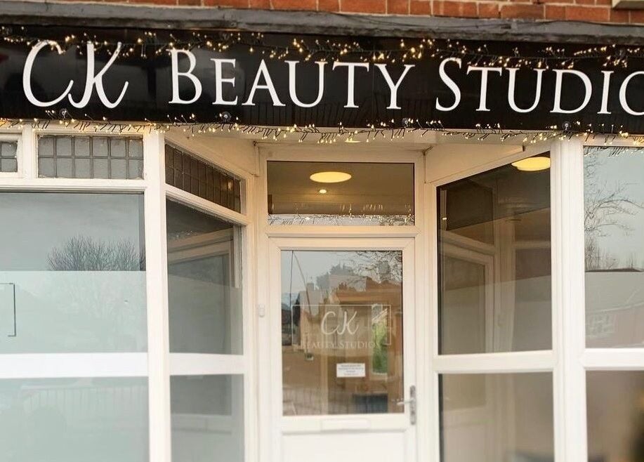 Entrance of CK Beauty Studios in Ilkeston, England, GB with elegant signage.