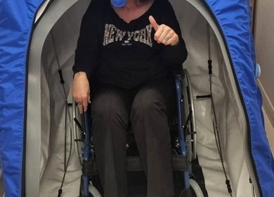 Customer enjoying hyperbaric chamber at Oxygen Cove Cork, Cork, County Cork, IE in a relaxed setting.