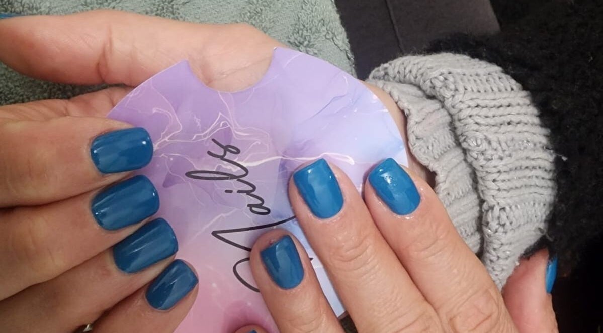 Vibrant blue nails at ZamZam Nails & Beauty, Cape Town, Western Cape, ZA, showcasing expert manicure.