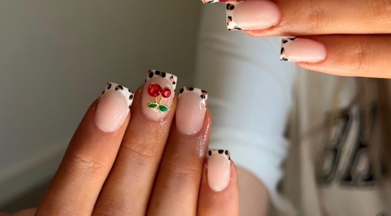 Stylish cherry-themed nail art from BeauteDeLuxeByMia, Selsey, England, GB.