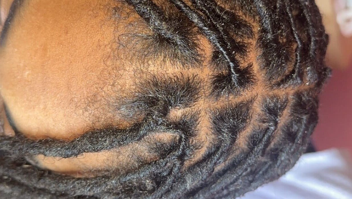 Detailed braiding at Styled by Nads, London, England, GB showcases intricate hair artistry.