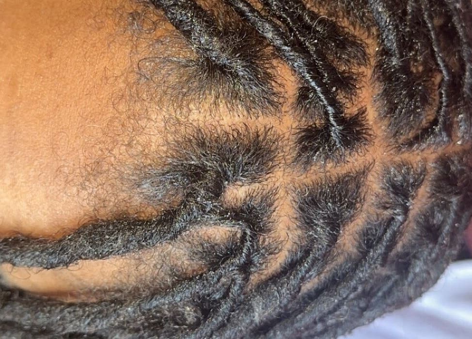 Detailed braiding at Styled by Nads, London, England, GB showcases intricate hair artistry.