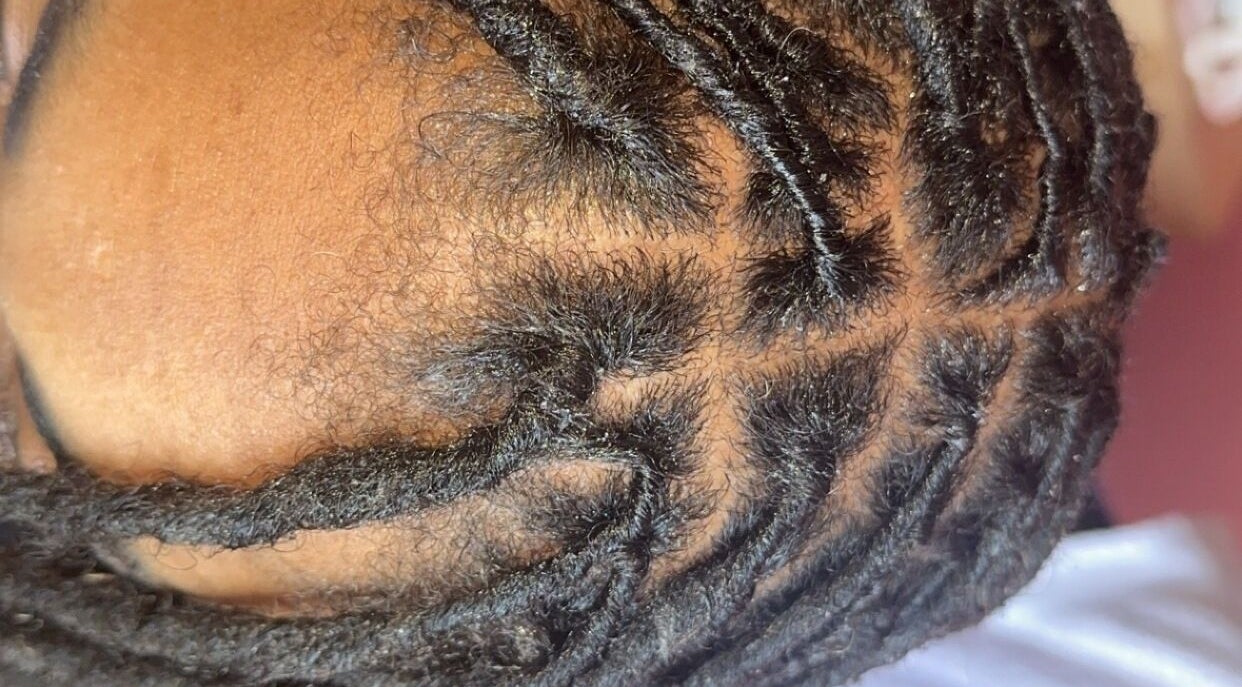 Detailed braiding at Styled by Nads, London, England, GB showcases intricate hair artistry.