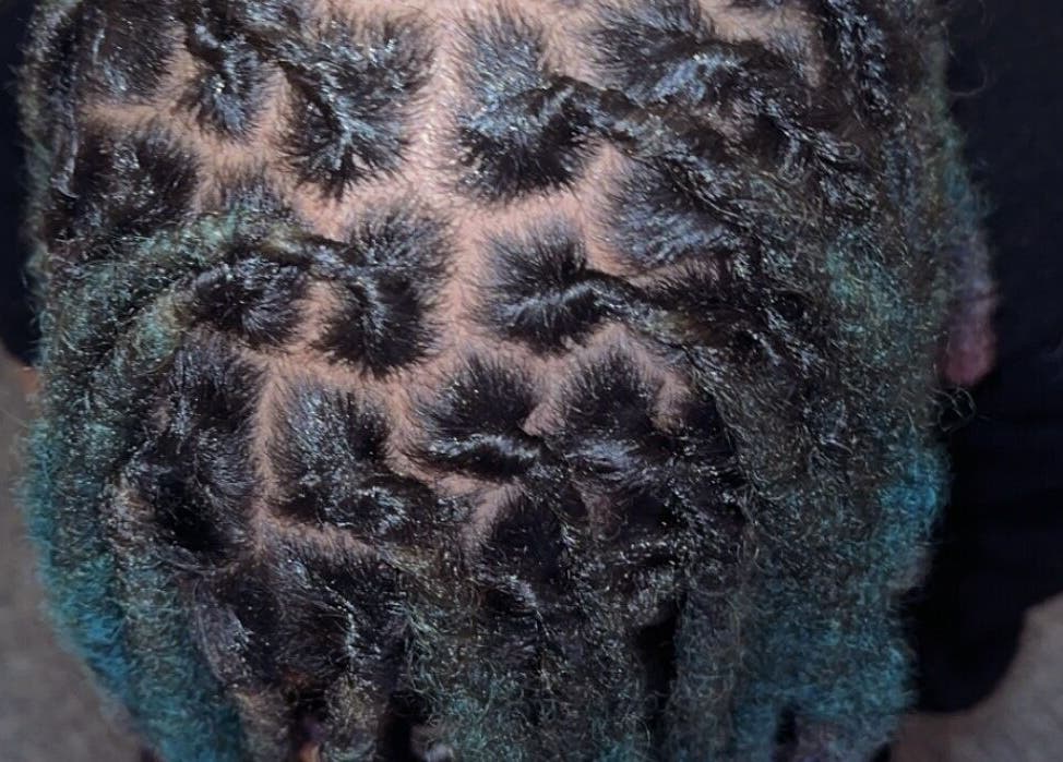 Stylish dreadlock design at Styled by Nads, London, England, GB showcasing unique hair artistry.