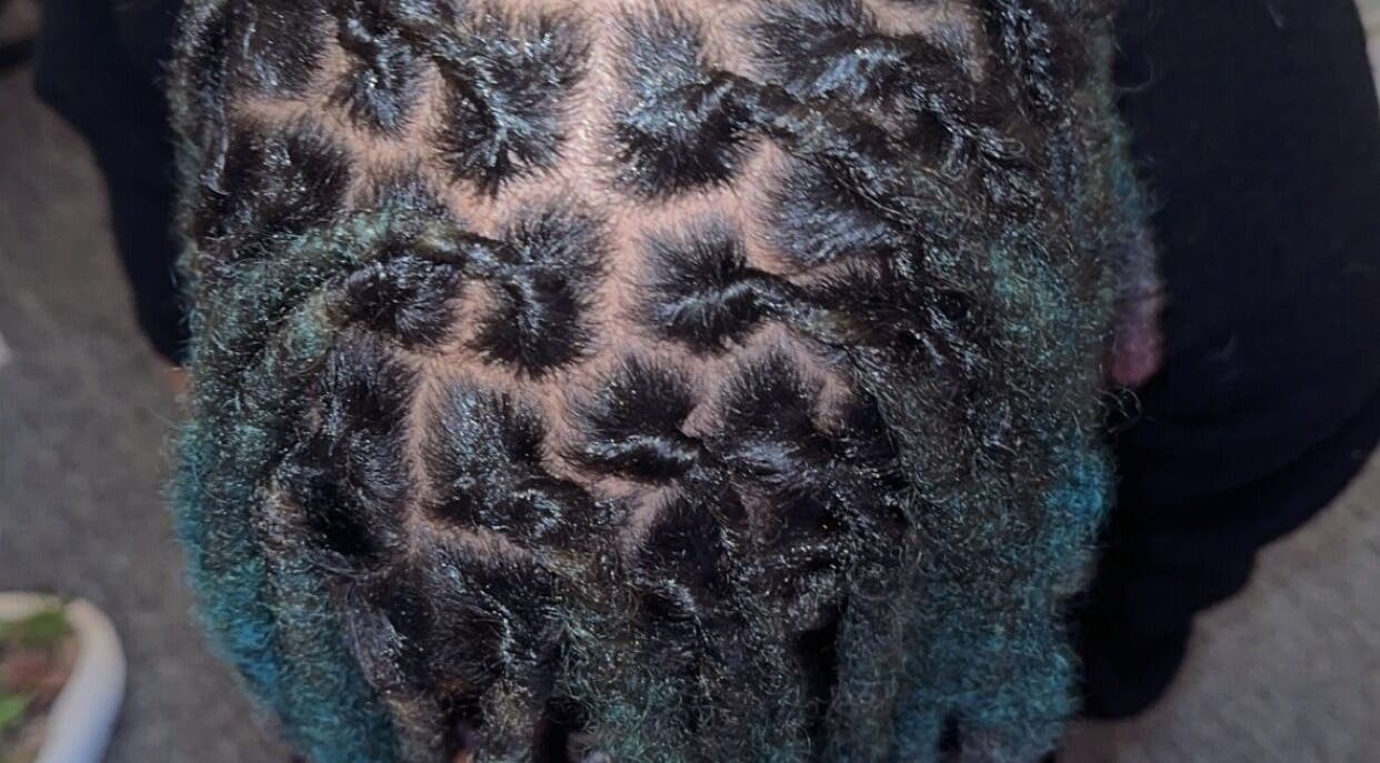 Stylish dreadlock design at Styled by Nads, London, England, GB showcasing unique hair artistry.